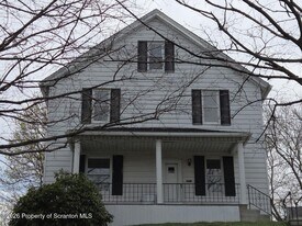 138 Charles St in Throop, PA - Building Photo