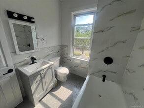 62 Woodland Ave in New Rochelle, NY - Building Photo - Building Photo