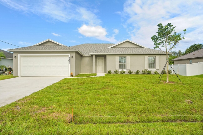 5884 NW Files Ct in Port St. Lucie, FL - Building Photo - Building Photo