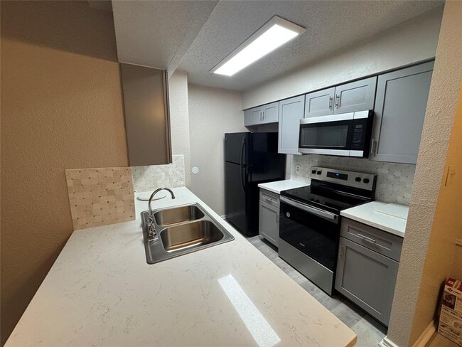property at 10101 S Gessner Rd