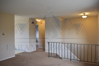 4242 E Grays Gable Rd in Laramie, WY - Foto de edificio - Building Photo