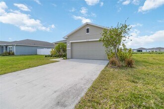 212 Aquamarine Ln in Kissimmee, FL - Foto de edificio - Building Photo