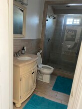10725 Westminster Ave, Unit 102 in Los Angeles, CA - Building Photo - Building Photo