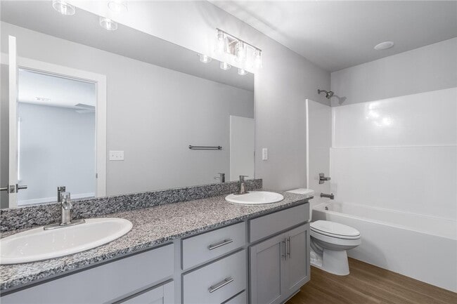 property at 6302 NW Kathleen St