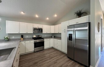 1195 CHIASSON Ave in Okahumpka, FL - Building Photo - Building Photo