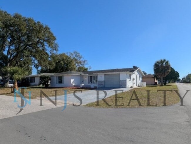 7824 Ironbark Dr in Port Richey, FL - Building Photo - Building Photo