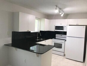 3790 N Jog Rd, Unit 106 in West Palm Beach, FL - Building Photo - Building Photo