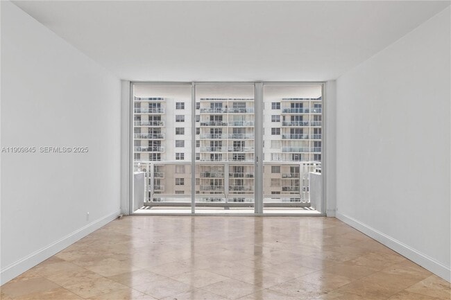 property at 5700 Collins Ave