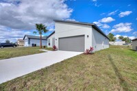 107 Lily Ln in Poinciana, FL - Building Photo - Building Photo