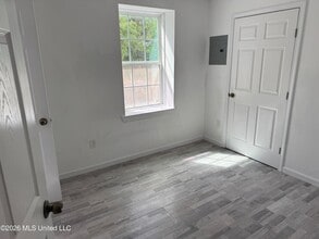 212 E 2nd St in Pass Christian, MS - Foto de edificio - Building Photo