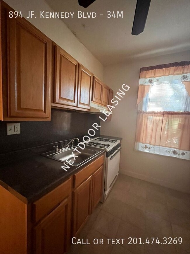 property at 894 John F. Kennedy Blvd