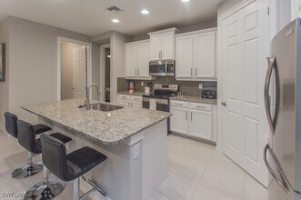 14670 Catamaran Pl in Naples, FL - Building Photo - Building Photo