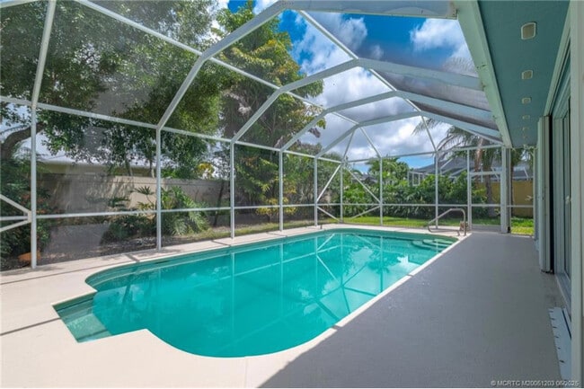 property at 2102 SW Mayflower Dr