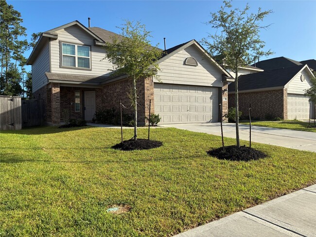 6133 Dunsmore Cyn Ln in Porter, TX - Foto de edificio - Building Photo