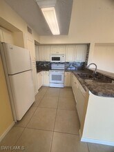 1150 Wildwood Lakes Blvd in Naples, FL - Foto de edificio - Building Photo