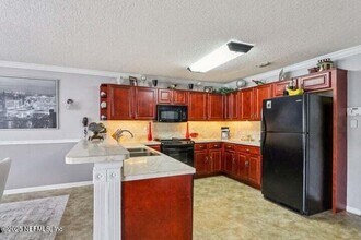 4581 Muscadine Ct in Jacksonville, FL - Foto de edificio - Building Photo