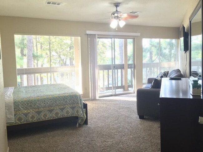 1413 April Villas, Unit D in Montgomery, TX - Building Photo - Building Photo