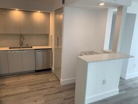 1450 Brickell Bay Dr, Unit 1506 in Miami, FL - Building Photo