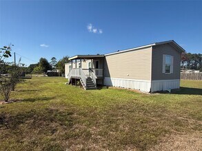 239 Road 5027 Rd in Cleveland, TX - Building Photo - Building Photo