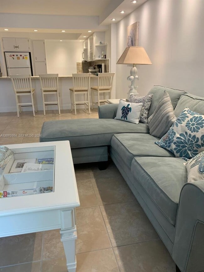 property at 5701 Collins Ave