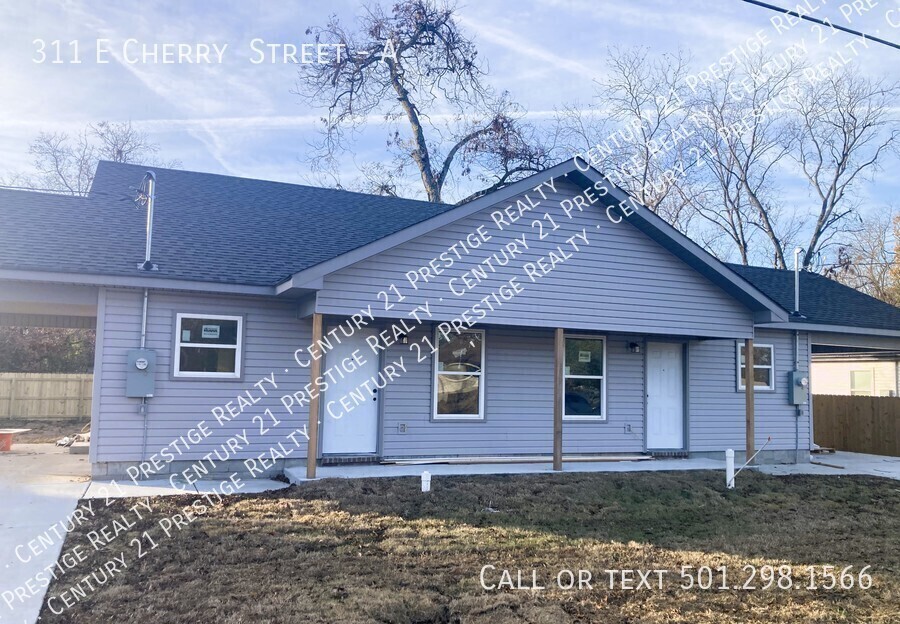 311 E Cherry St in Lonoke, AR - Building Photo