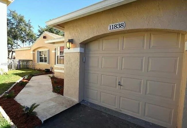 property at 11838 NW 13th St