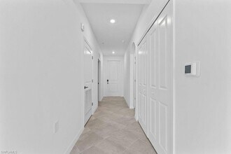 5555 Double Eagle Cir, Unit 3933 in Ave Maria, FL - Foto de edificio - Building Photo