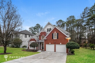 6877 Spreadlong Oaks Dr in Stone Mountain, GA - Foto de edificio - Building Photo
