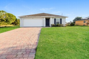 3020 64th St W, Unit 1010NoelDrive,#25 in Lehigh Acres, FL - Building Photo