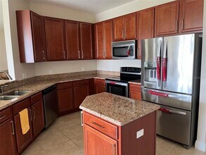 3817 Golden Feather Way in Kissimmee, FL - Building Photo - Building Photo