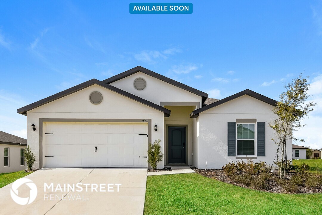 1673 Hideaway Flat St in Mascotte, FL - Building Photo