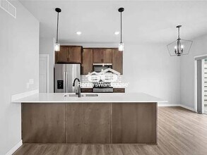 36 Keeneland Ct. in Pleasant Hill, IA - Building Photo - Building Photo