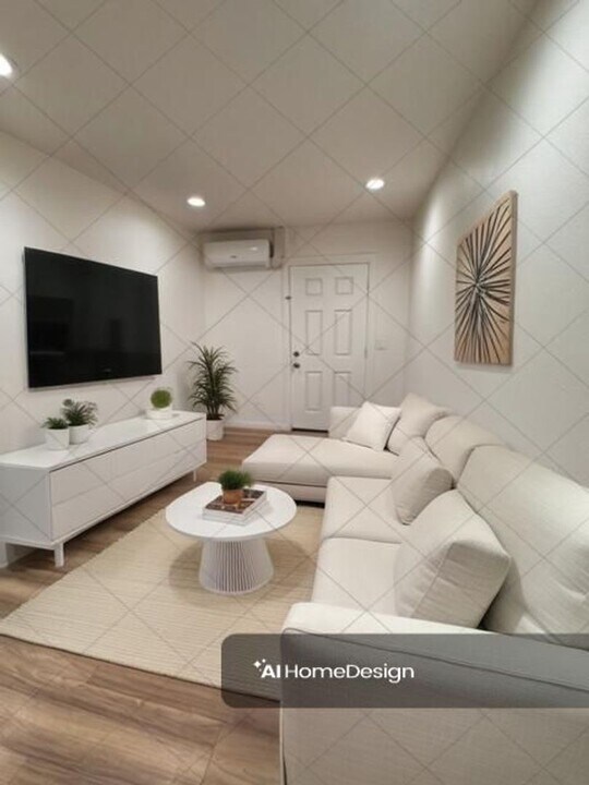 8637 S Hoover St in Los Angeles, CA - Building Photo