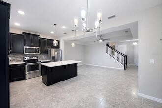 3749 Brighton Park Cir in Belle Isle, FL - Building Photo - Building Photo