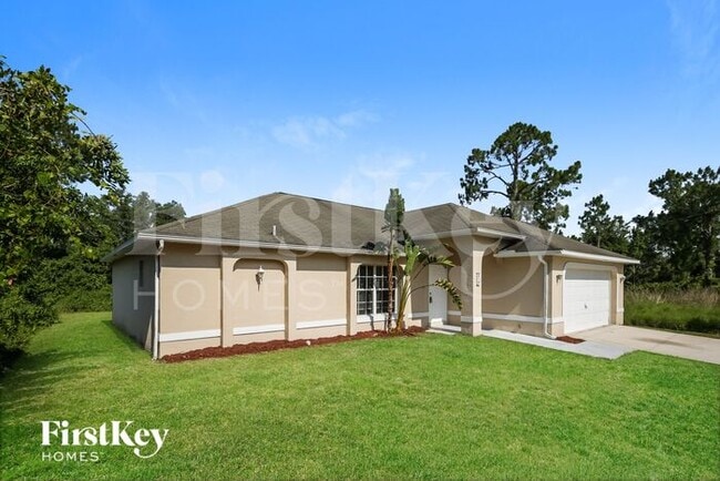 315 Dill Ave in Lehigh Acres, FL - Building Photo - Building Photo