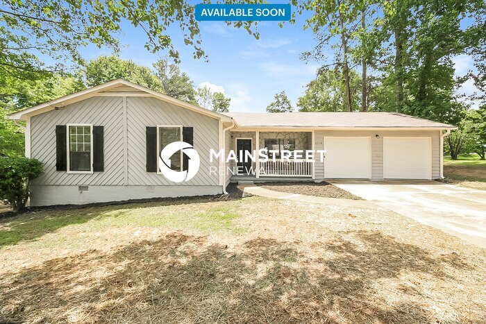 6974 Babbling Brook Dr in Rex, GA - Building Photo