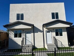 411 E 99th St in Los Angeles, CA - Building Photo - Building Photo