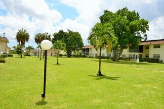 9949 Sandalfoot Blvd in Boca Raton, FL - Building Photo - Building Photo