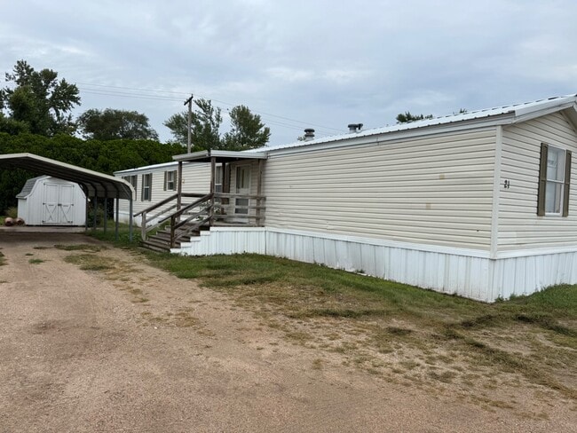 property at 204 E 1st St