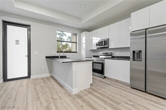 1028 Milwaukee Blvd in Lehigh Acres, FL - Building Photo - Building Photo