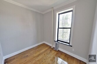 E 105TH ST., Unit 21 in New York, NY - Building Photo - Building Photo