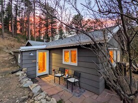 32114 Upper Bear Creek Rd in Evergreen, CO - Building Photo