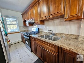 Spacious 3-Bedroom Apartment in Woodside in Queens, NY - Building Photo - Building Photo