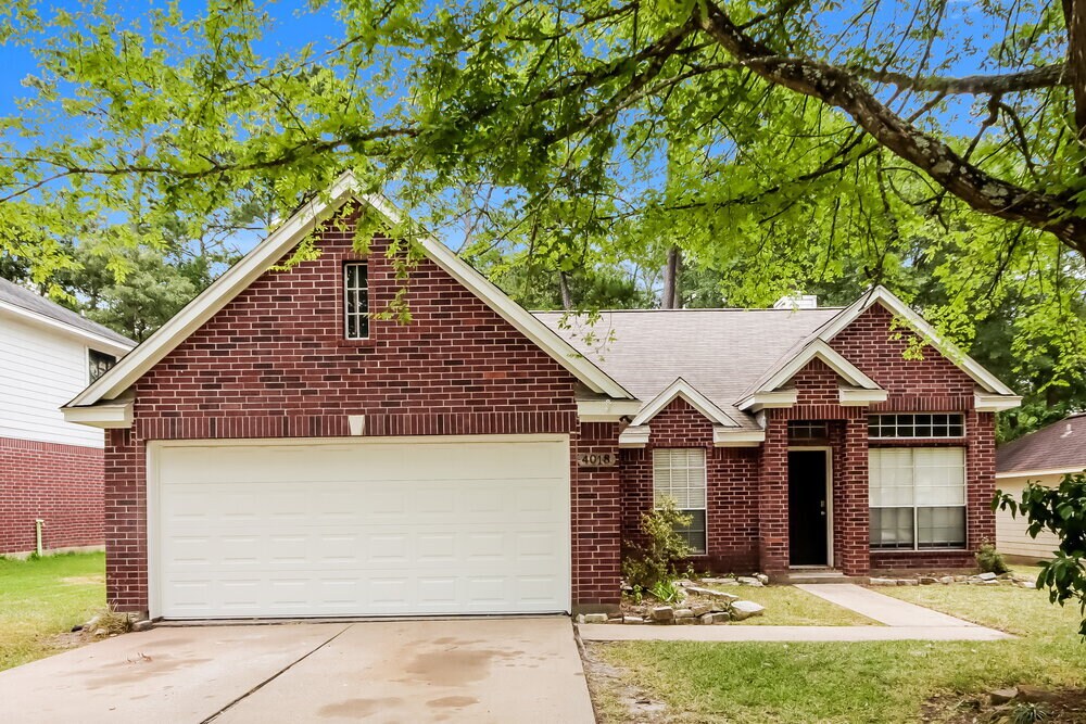 4018 Hunnington Dr in Conroe, TX - Building Photo