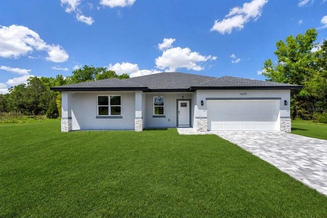 property at 16276 SW 17th Terr Rd