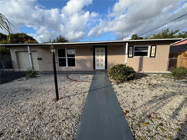 property at 4411 NW 24th St