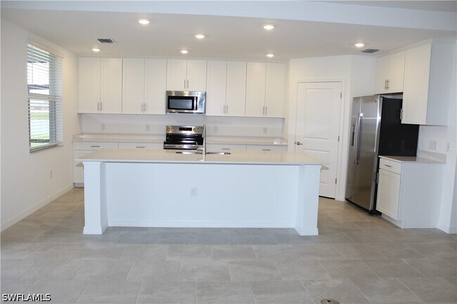 5661 Melbourne Ct in Ave Maria, FL - Foto de edificio - Building Photo