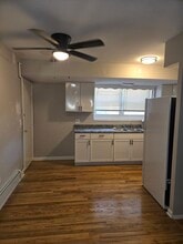 1714 W Touhy Ave, Unit D1N in Chicago, IL - Building Photo - Building Photo