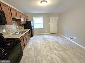 1207 E Lanvale St in Baltimore, MD - Building Photo - Building Photo