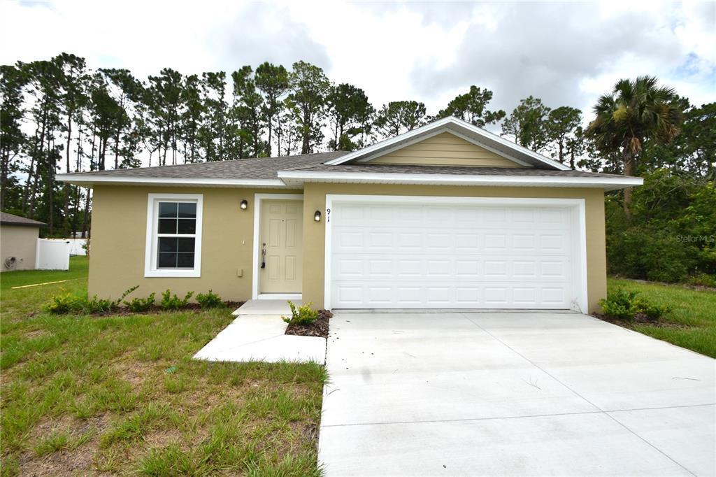 91 Pickering Dr in Palm Coast, FL - Building Photo